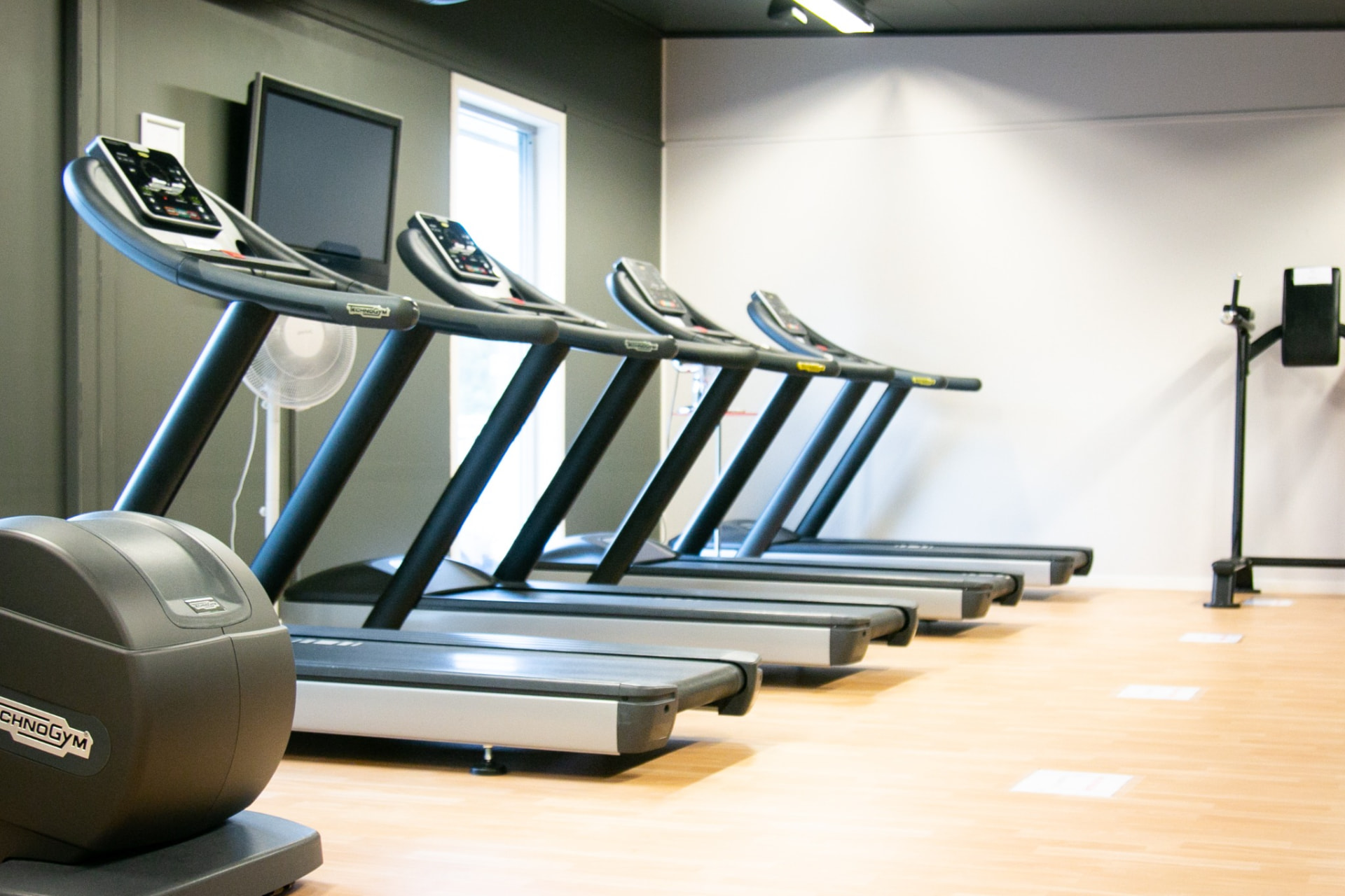 Tredemøller i treningsområdet hos Trimfit